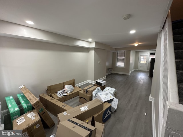 below grade area with recessed lighting, baseboards, and wood finished floors