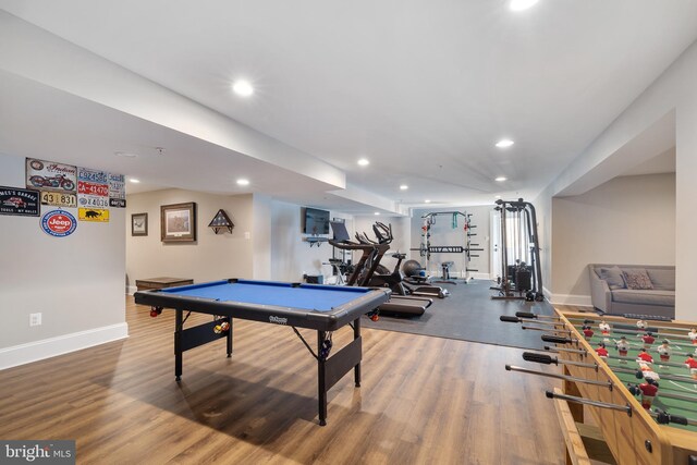rec room with recessed lighting, baseboards, and wood finished floors