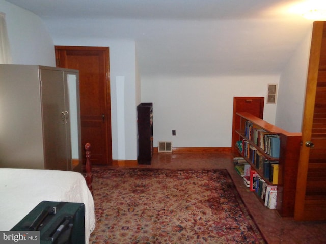 bedroom featuring visible vents