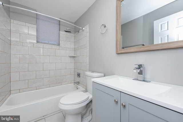 bathroom featuring bathing tub / shower combination, vanity, and toilet
