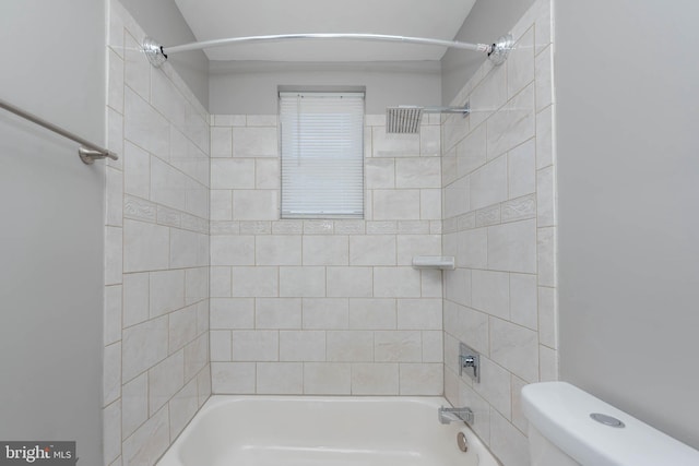 full bathroom featuring toilet and  shower combination