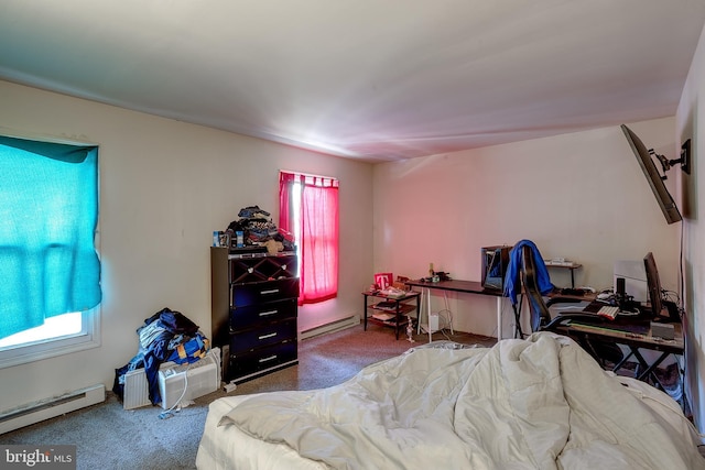 bedroom featuring carpet floors, baseboard heating, and multiple windows