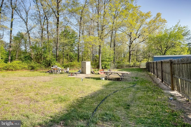 view of yard featuring fence
