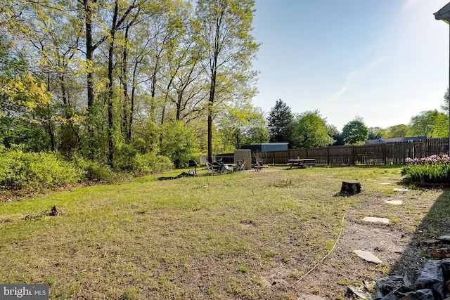 view of yard with fence