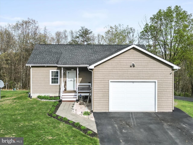 single story home featuring a porch, a front lawn, driveway, and roof with shingles
