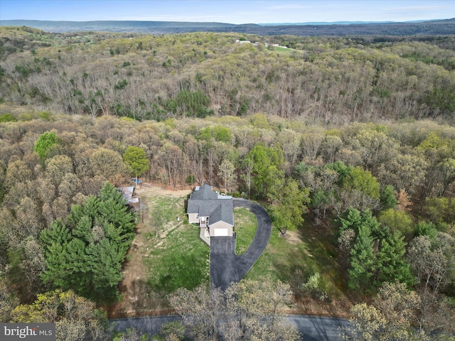drone / aerial view with a forest view