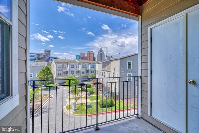 balcony featuring a view of city
