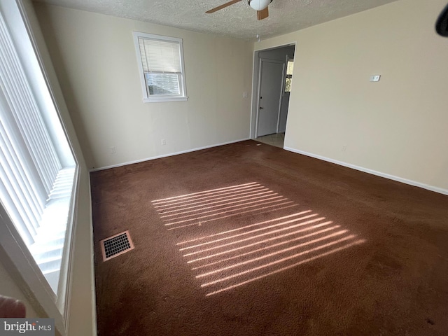 5714 63rd Ave, Riverdale, MD 20737 - carpeted empty room featuring a textured ceiling, a ceiling fan, and baseboards