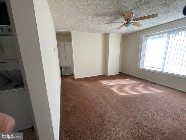 5714 63rd Ave, Riverdale, MD 20737 - carpeted empty room with a ceiling fan, a textured ceiling, and baseboards