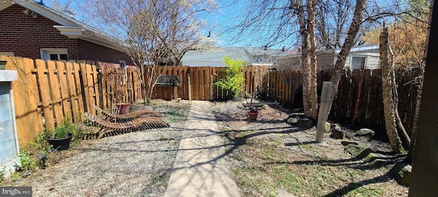 view of yard featuring a fenced backyard