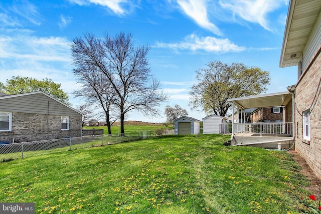 22 Spring Ridge Dr, York, PA 17408 - view of yard with a storage shed, an outdoor structure, and fence