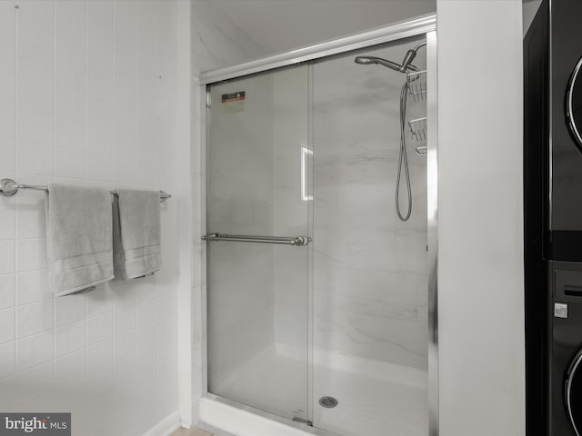 bathroom with a shower stall