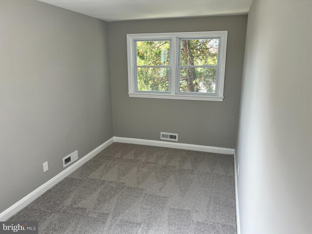 4301 Brehms Ln, Baltimore, MD 21206 - spare room featuring carpet floors and baseboards