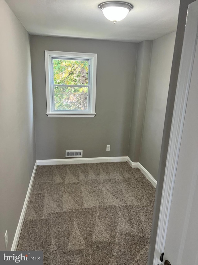 4301 Brehms Ln, Baltimore, MD 21206 - unfurnished room featuring carpet floors and baseboards