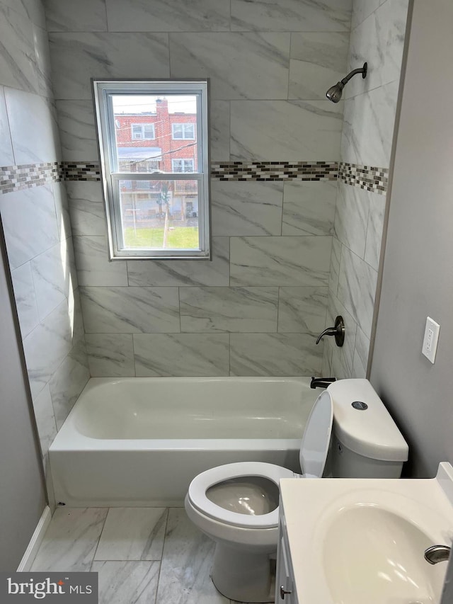 4301 Brehms Ln, Baltimore, MD 21206 - full bathroom with toilet, vanity,  shower combination, and marble finish floors