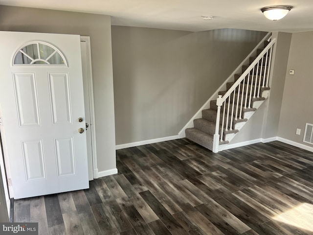 4301 Brehms Ln, Baltimore, MD 21206 - entrance foyer featuring dark wood-type flooring, baseboards, and stairway