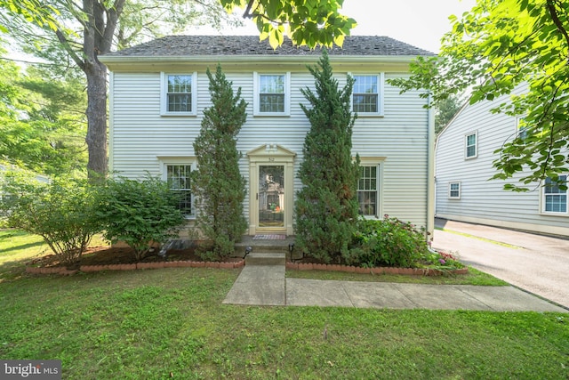 312 Fairgrove Ter, Gaithersburg, MD 20877 - colonial house with a front lawn