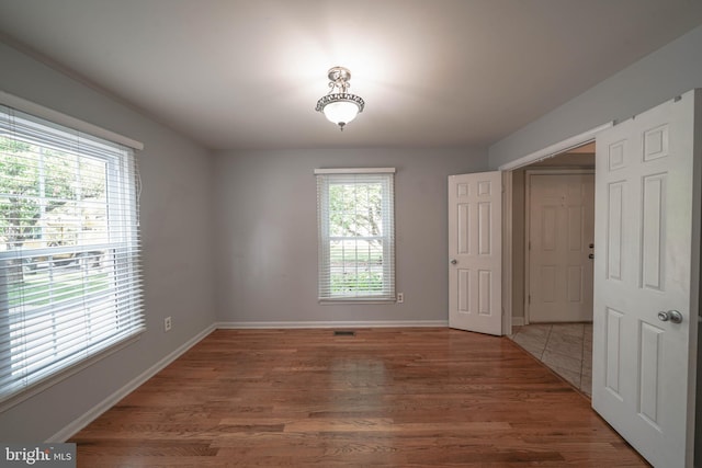 312 Fairgrove Ter, Gaithersburg, MD 20877 - empty room featuring wood finished floors and baseboards