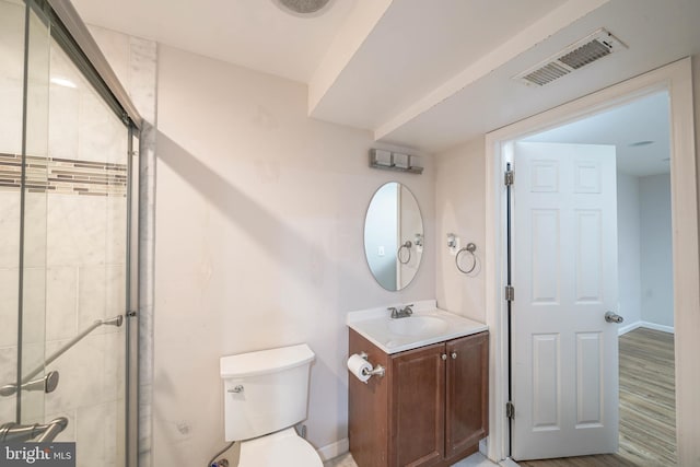 312 Fairgrove Ter, Gaithersburg, MD 20877 - full bath featuring vanity, tiled shower, and wood finished floors