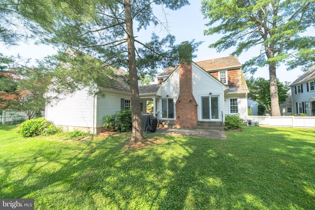 312 Fairgrove Ter, Gaithersburg, MD 20877 - back of property featuring a chimney, a patio, and entry steps
