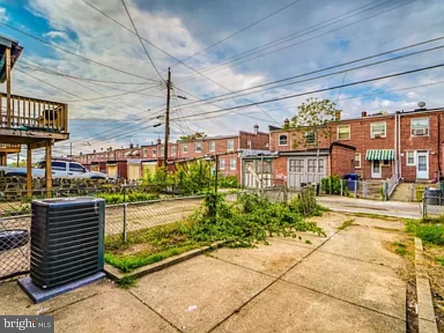surrounding community featuring fence