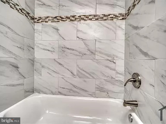 bathroom featuring shower / washtub combination