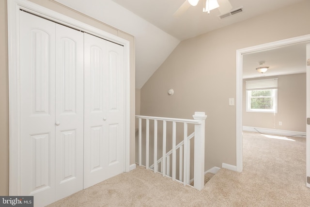 4808 Frazier Neck Rd, Preston, MD 21655 - corridor with carpet floors, lofted ceiling, an upstairs landing, and visible vents