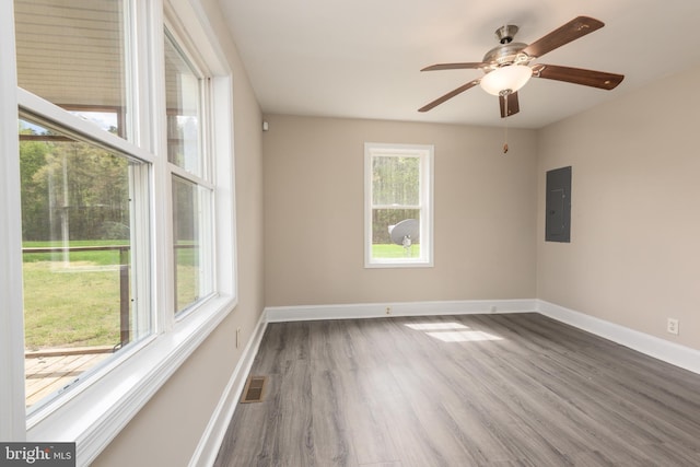 4808 Frazier Neck Rd, Preston, MD 21655 - spare room with wood finished floors, visible vents, a ceiling fan, electric panel, and baseboards
