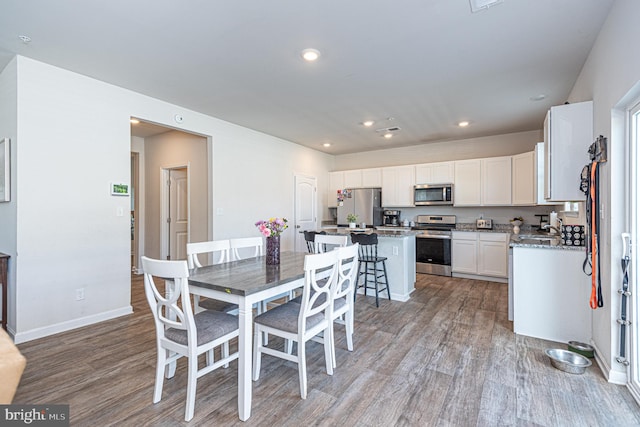 417 Lena Ln, Fruitland, MD 21826 - dining room featuring recessed lighting, light wood-style flooring, and baseboards