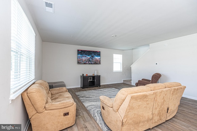 417 Lena Ln, Fruitland, MD 21826 - living room featuring baseboards, wood finished floors, and visible vents