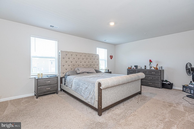 417 Lena Ln, Fruitland, MD 21826 - bedroom featuring light carpet, baseboards, and visible vents