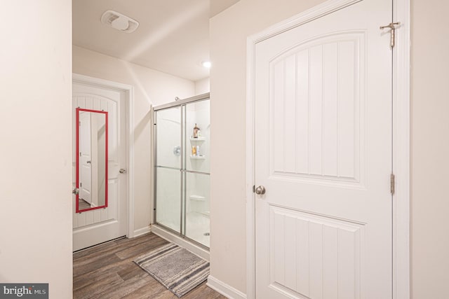 417 Lena Ln, Fruitland, MD 21826 - full bath with baseboards, wood finished floors, visible vents, and a stall shower