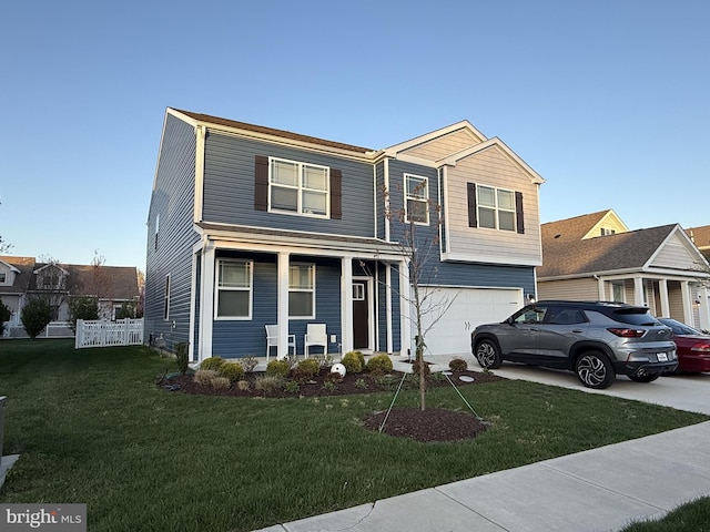 417 Lena Ln, Fruitland, MD 21826 - traditional-style home featuring covered porch, a front yard, fence, an attached garage, and concrete driveway