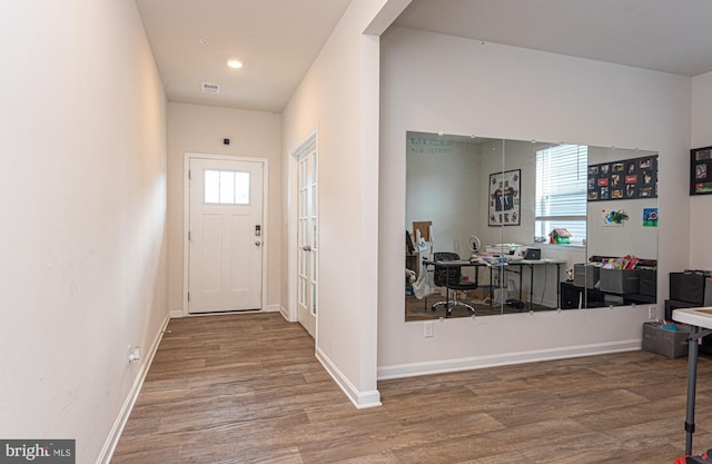 417 Lena Ln, Fruitland, MD 21826 - foyer featuring baseboards, wood finished floors, and visible vents