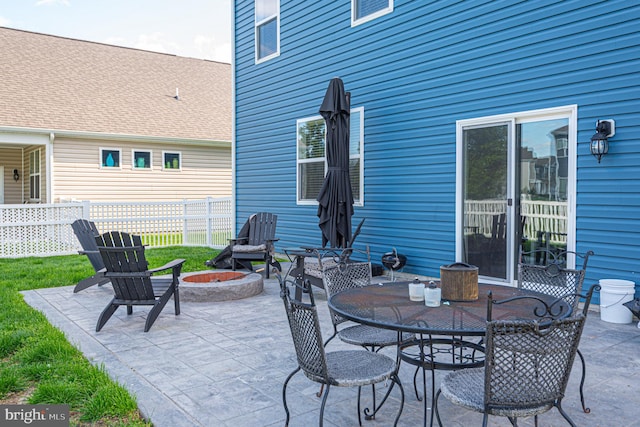 417 Lena Ln, Fruitland, MD 21826 - view of patio featuring an outdoor fire pit and fence