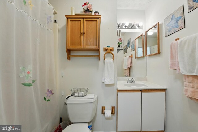 6775 Rugby Pl, Bealeton, VA 22712 - bathroom featuring toilet, a shower with curtain, and vanity