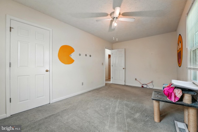 6775 Rugby Pl, Bealeton, VA 22712 - unfurnished room with baseboards, carpet, a ceiling fan, and a textured ceiling