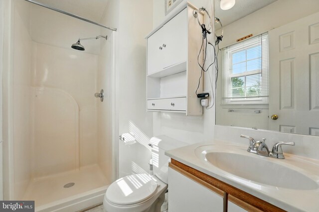 6775 Rugby Pl, Bealeton, VA 22712 - bathroom featuring vanity, a stall shower, and toilet