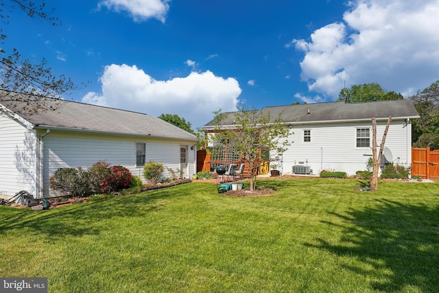 6775 Rugby Pl, Bealeton, VA 22712 - rear view of house featuring central AC, a yard, and fence