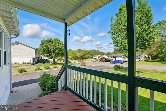 6775 Rugby Pl, Bealeton, VA 22712 - wooden terrace featuring a porch, a yard, and a residential view