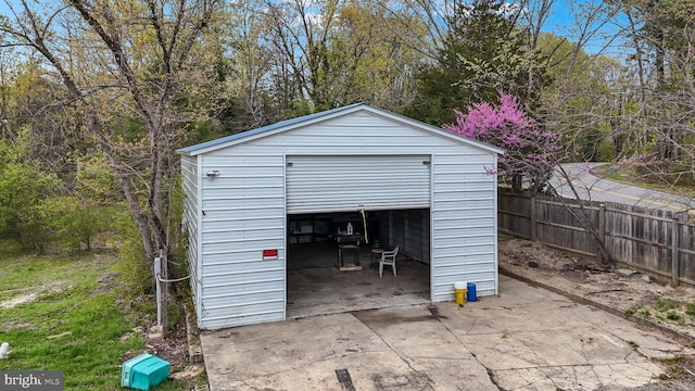 detached garage with fence