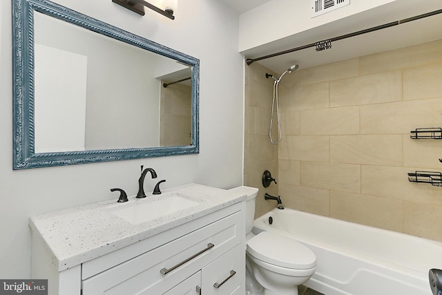 full bath featuring shower / bath combination, visible vents, toilet, and vanity