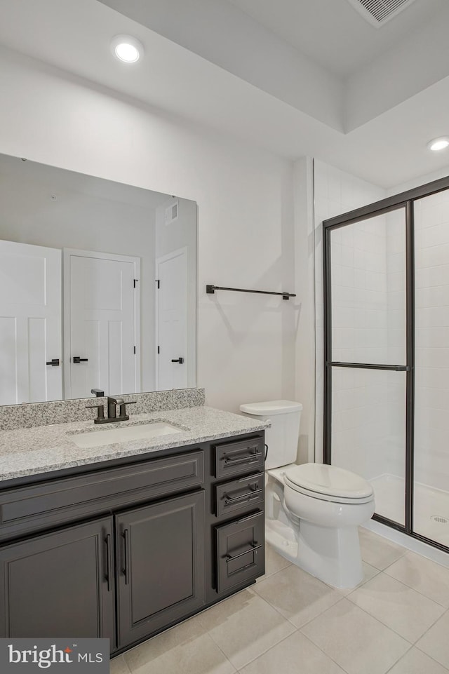6647 Camden St, Middle River, MD 21220 - bathroom featuring toilet, tile patterned floors, visible vents, a shower stall, and vanity