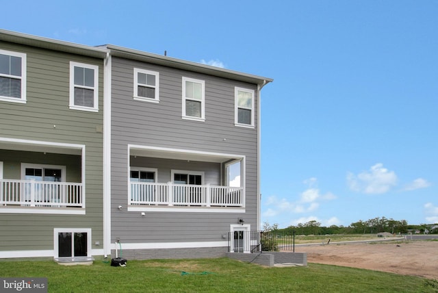 6647 Camden St, Middle River, MD 21220 - rear view of house featuring a lawn