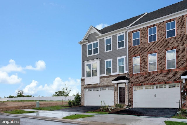 6647 Camden St, Middle River, MD 21220 - view of property featuring brick siding, a garage, and aphalt driveway