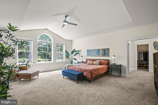 bedroom featuring vaulted ceiling, carpet floors, a ceiling fan, and baseboards
