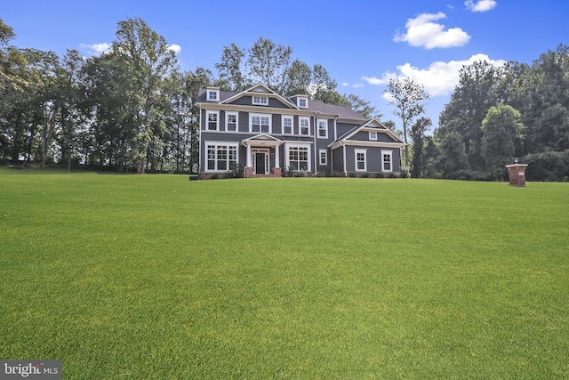 view of front of home featuring a front yard
