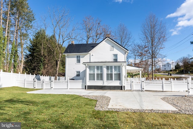 548 Uniontown Rd, Westminster, MD 21158 - back of property featuring a yard, a fenced backyard, a patio, a gate, and a chimney