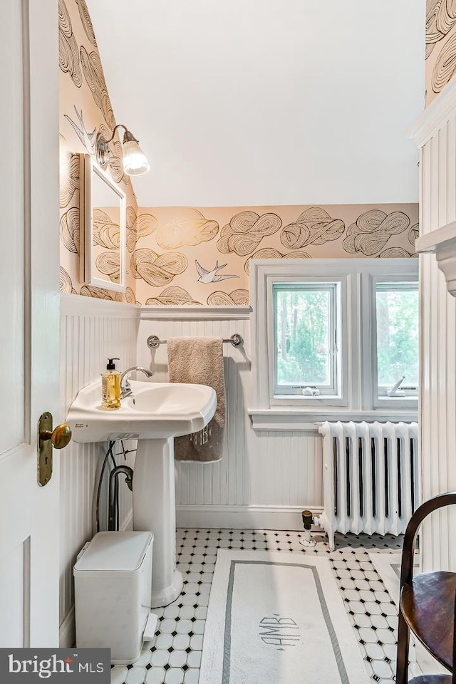 213 Pine Tree Rd, Wayne, PA 19087 - bathroom with radiator heating unit, wainscoting, and a decorative wall