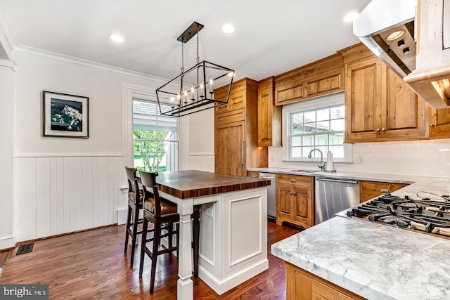 213 Pine Tree Rd, Wayne, PA 19087 - kitchen with dishwasher, ornamental molding, wainscoting, a chandelier, and dark wood-style floors